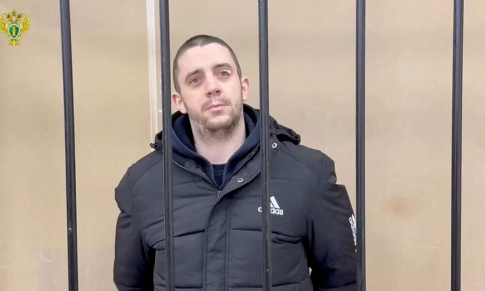 Hayden Davies, 30, is reported to have served in the British armed forces. Pic: Reuters.