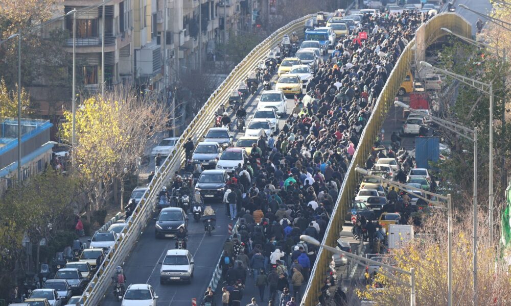 Protesters march in Tehran. Pic: Fars News Agency/AP