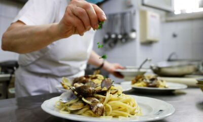A chef prepares spaghetti alle vongole (spaghetti with clams) in Rome in 2021. File pic: Reuters