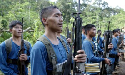 Members of the Filipino New People's Army show their weapons. Pic: Reuters