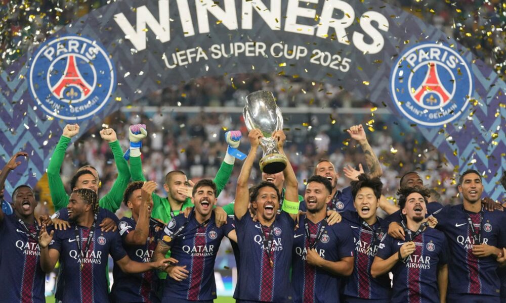 PSG's Marquinhos lifts the UEFA Super Cup trophy. Pic: AP