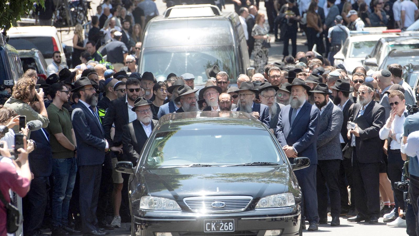Mourners pay respects at funeral of Bondi attack victim Rabbi Eli Schlanger | World News