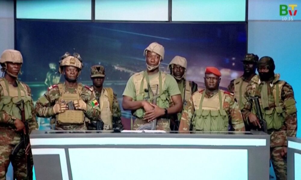 A group of soldiers appeared on Benin's national television, claiming to have seized power. Pic: Reuters
