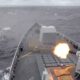A ship fires a weapon during drills east of Taiwan, in this screenshot from a video released by the Eastern Theatre Command