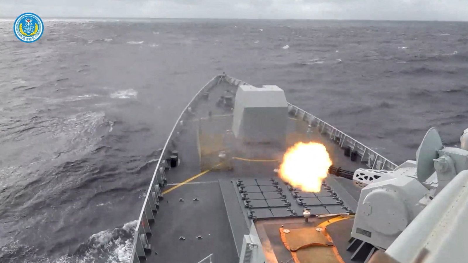 A ship fires a weapon during drills east of Taiwan, in this screenshot from a video released by the Eastern Theatre Command