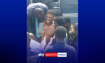 Joshua helped from vehicle after fatal car crash in Nigeria