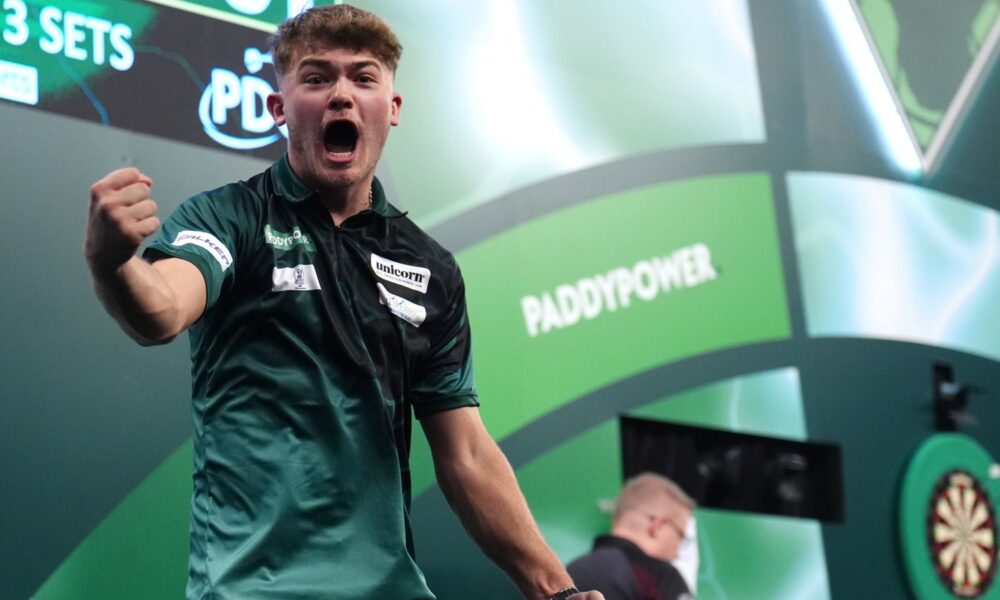 Charlie Manby celebrates defeating Cameron Menzies on day five of the Paddy Power World Darts Championship at the Alexandra Palace, London.