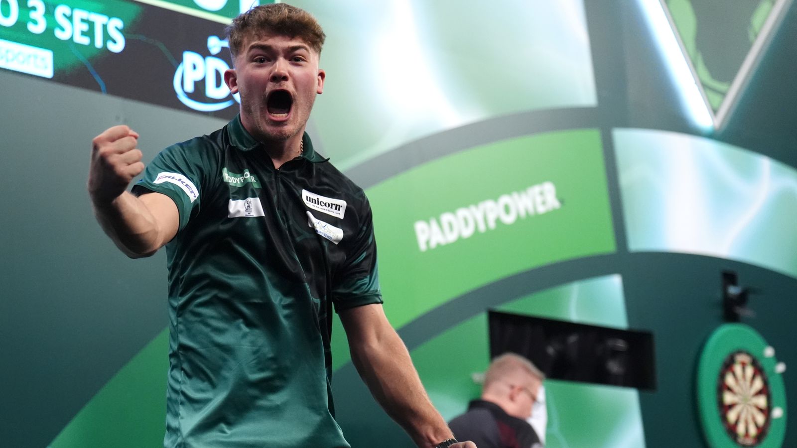 Charlie Manby celebrates defeating Cameron Menzies on day five of the Paddy Power World Darts Championship at the Alexandra Palace, London.