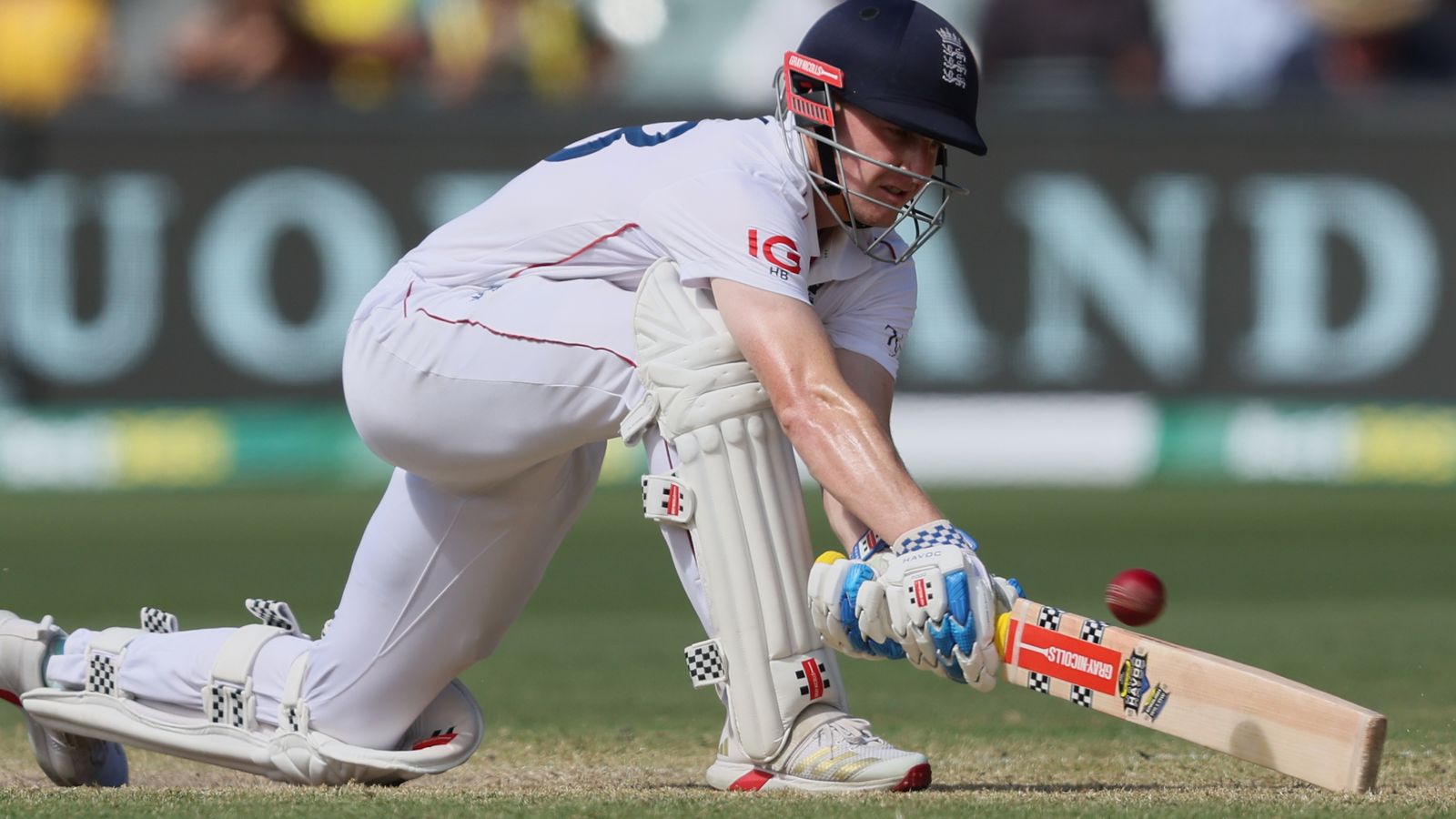 England's Harry Brook plays a sweep shot during play on day four of the third Ashes cricket test between England and Australia in Adelaide, Australia, Saturday, Dec. 20, 2025. (AP Photo/James Elsby)