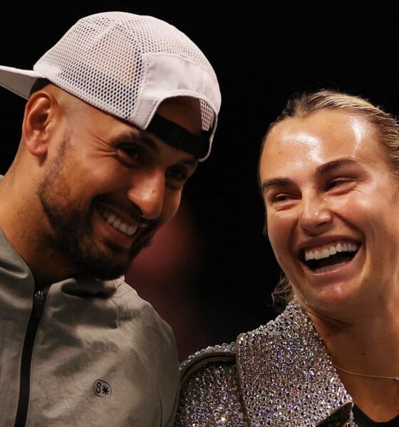 Aryna Sabalenka and Nick Kyrgios laugh ahead of their Battle of the Sexes tennis match in Dubai, United Arab Emirates, Sunday Dec. 28, 2025. (Amr Alfiky/Pool Photo via AP)
