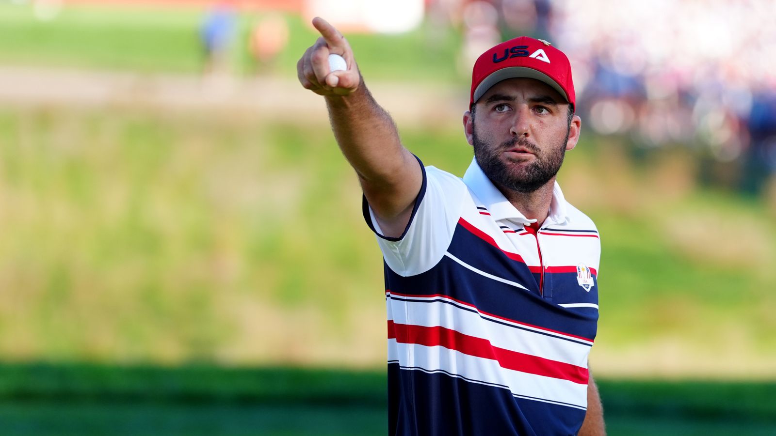 Scottie Scheffler of Team United States reacts on the 17th during the Sunday singles matches on day three of the 2025 Ryder Cup