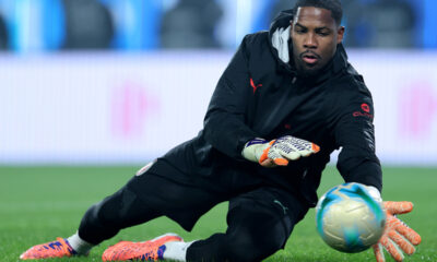 RIYADH, SAUDI ARABIA - DECEMBER 18: Mike Maignan of AC Milan warms up prior to the Supercoppa Italiana Semi-Final match between SSC Napoli and AC Milan at King Saud University Stadium on December 18, 2025 in Riyadh, Saudi Arabia. (Photo by Abdullah Ahmed/Getty Images)