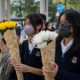 Hong Kong stifles dissent after fire draws an outpouring of public sympathy
