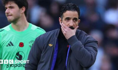 Luke Littler celebrates winning the 2026 PDC World Championship as tickertape falls