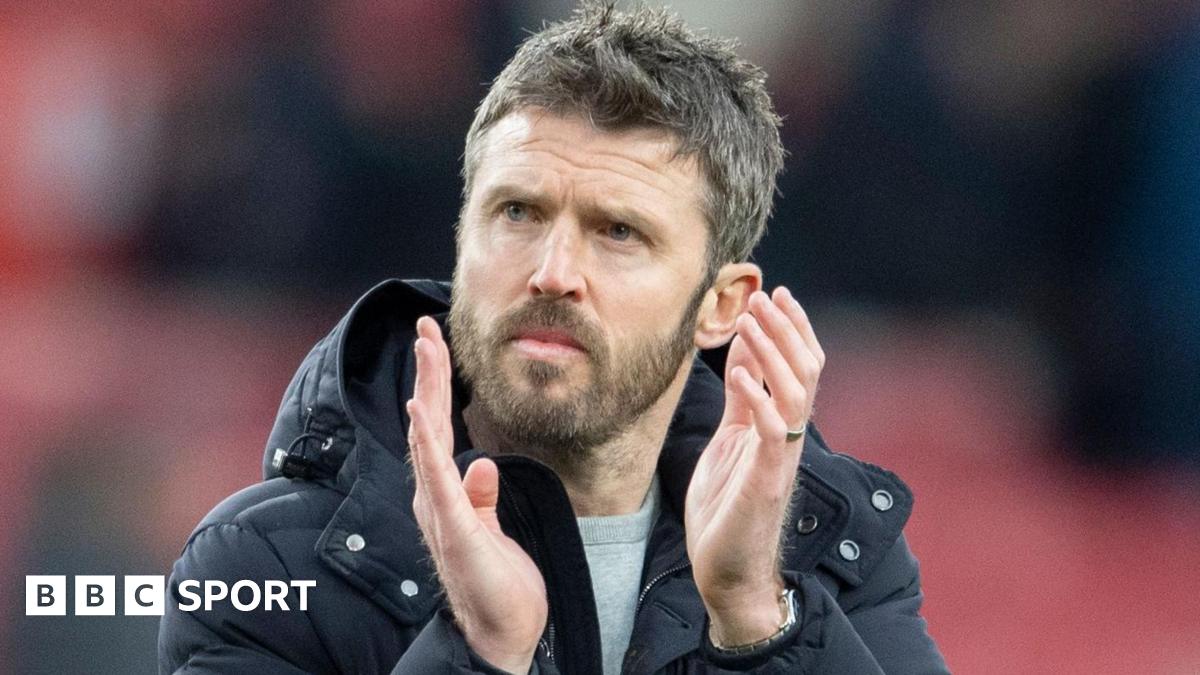 Michael Carrick applauds fans during his team in charge of Middlesbrough
