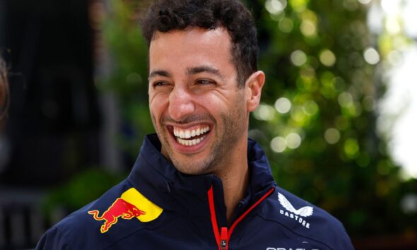 Daniel Ricciardo wearing a Red Bull jacket