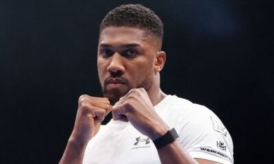 Anthony Joshua flies home to UK ahead of funeral after friends died in car crash