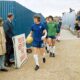 Eddie McCreadie leading the Chelsea side out while Stamford Bridge was being developed in the 1970s