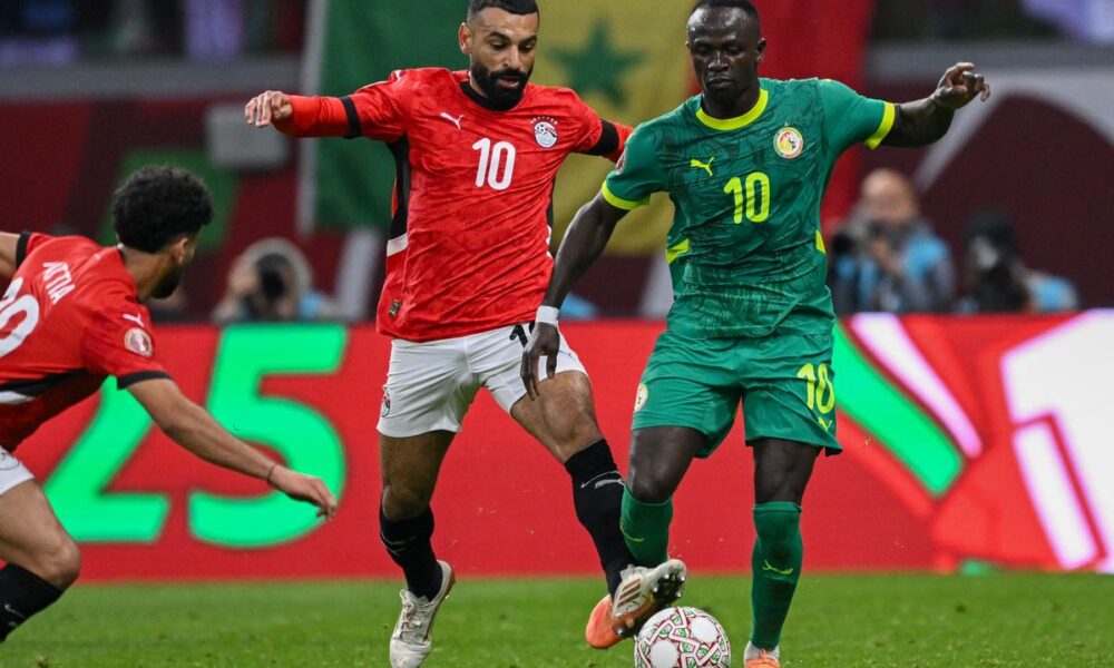 Mohamed Salah and Senegal's forward #10 Sadio Mane
