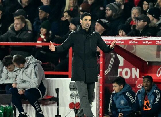 Mikel Arteta gesturing near the pitch