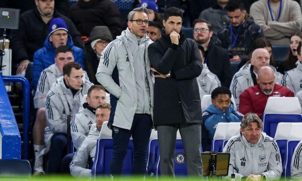 Albert Stuivenberg with Mikel Arteta during Arsenal's win against Chelsea