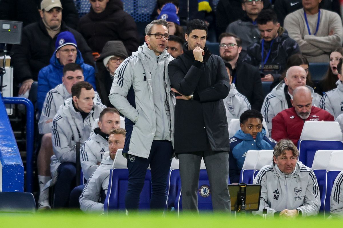 Albert Stuivenberg with Mikel Arteta during Arsenal's win against Chelsea