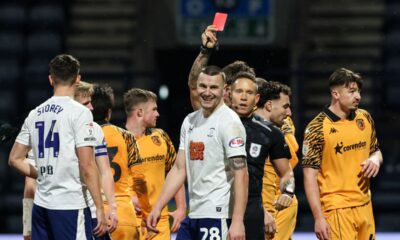 Referee Stephen Martin shows Preston North End's Milutin Osmajic a straight red