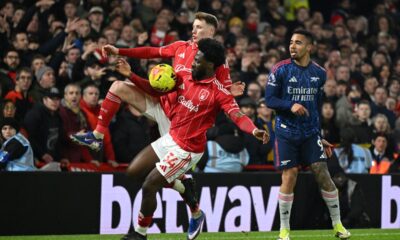 Ola Aina appears to handball inside the box
