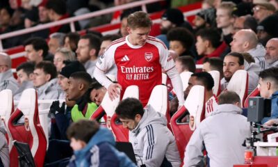 LONDON, ENGLAND - JANUARY 25: Martin Odegaard of Arsenal takes a seat in the dugout after being substituted off during the Premier League match between Arsenal and Manchester United at Emirates Stadium on January 25, 2026 in London, England. (Photo by Alex Pantling/Getty Images)