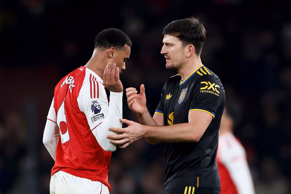 LONDON, ENGLAND - JANUARY 25: Gabriel of Arsenal clashes with Harry Maguire of Manchester United at full-time following the Premier League match between Arsenal and Manchester United at Emirates Stadium on January 25, 2026 in London, England. (Photo by Alex Pantling/Getty Images)