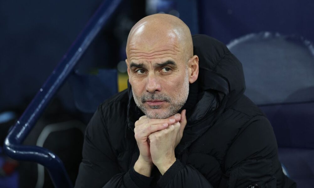 Pep Guardiola takes his place for the English Premier League football match between Manchester City and Brighton and Hove Albion