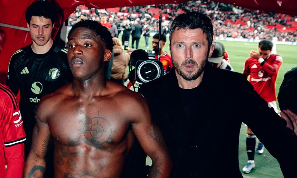 Kobbie Mainoo and Michael Carrick after the win over Manchester City
