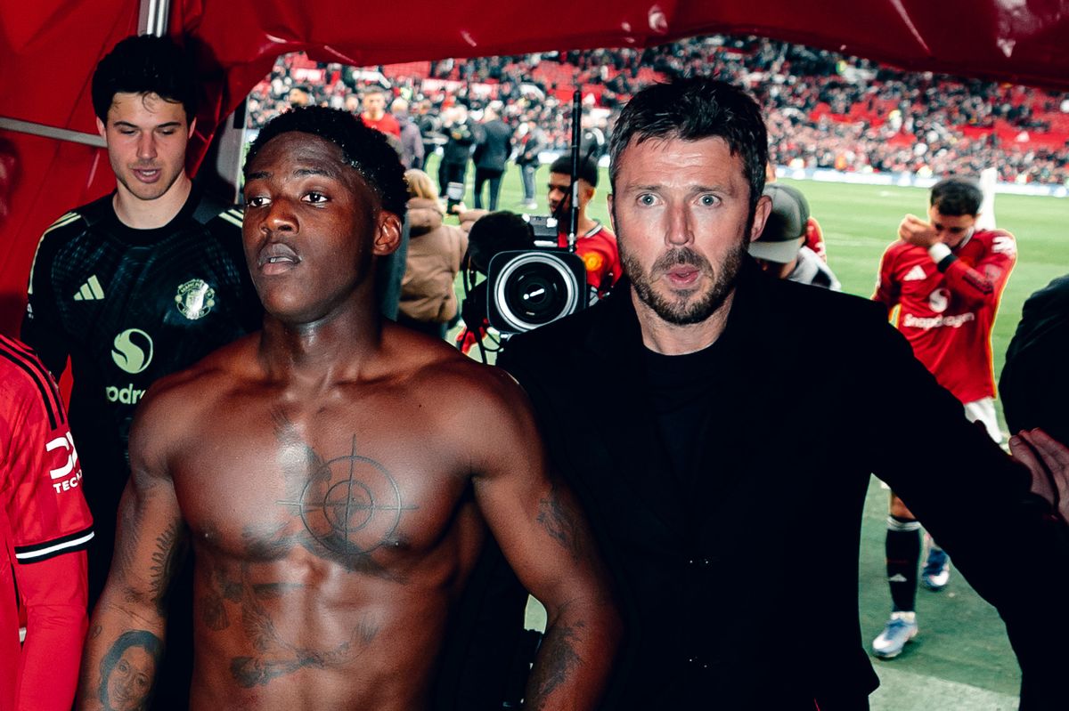 Kobbie Mainoo and Michael Carrick after the win over Manchester City