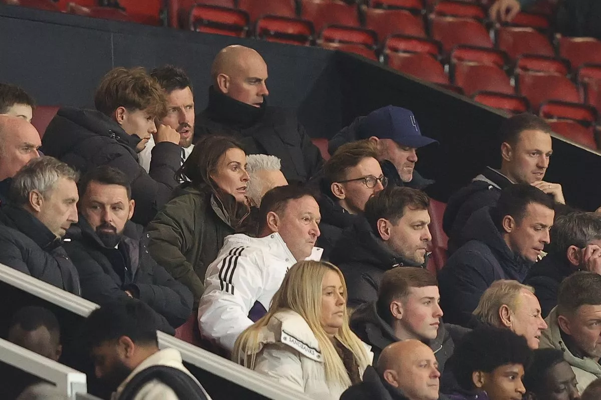 Wayne and Coleen Rooney watch on as son Kai, 16, makes Old Trafford debut