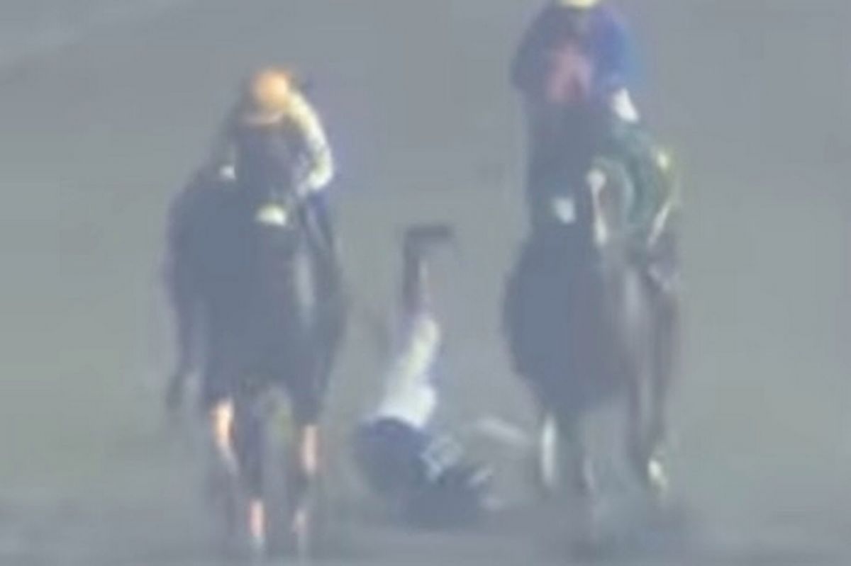 Elvin Abrea is thrown to the ground during the race