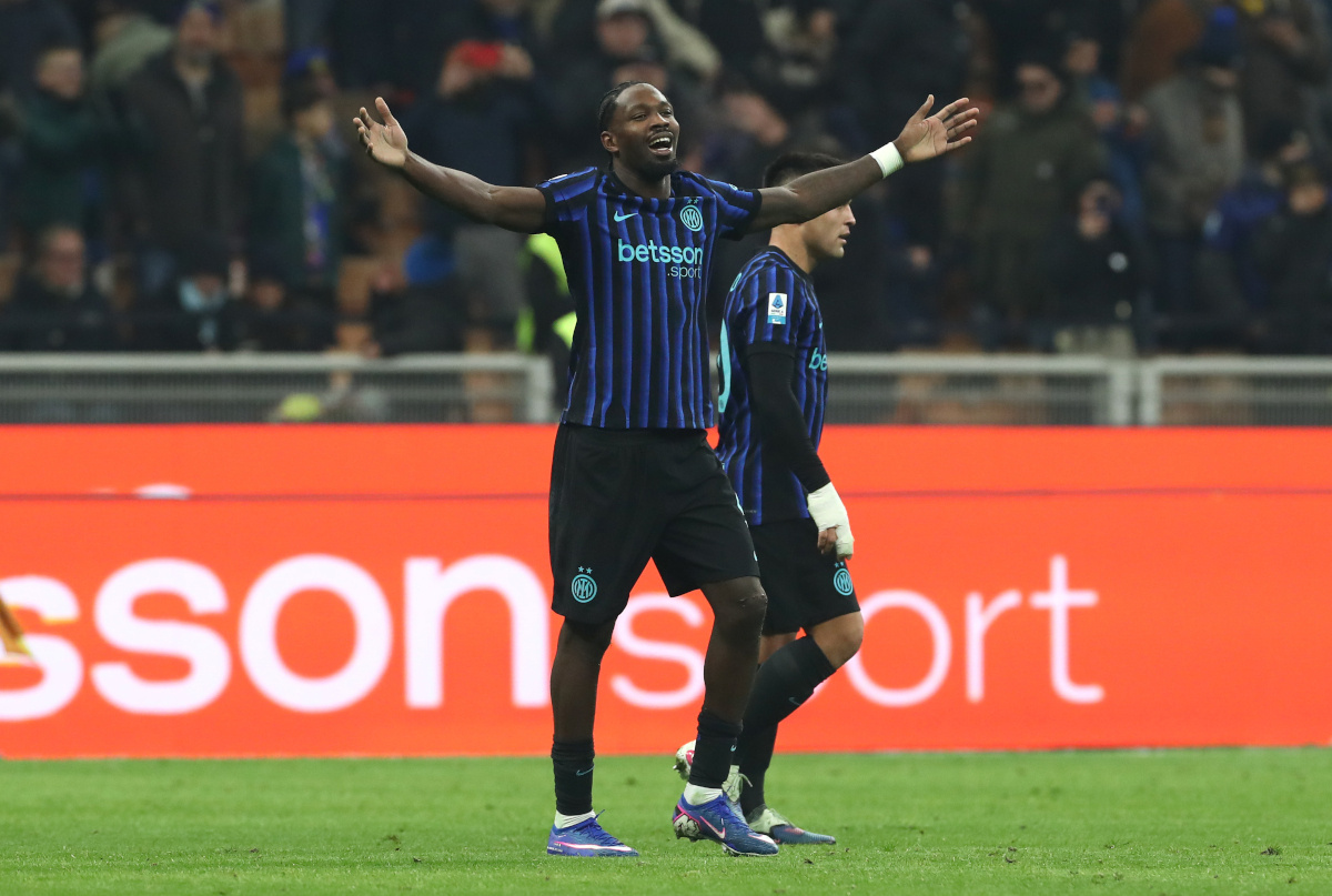 MILAN, ITALY - JANUARY 04: Marcus Thuram of FC Internazionale Milano celebrates scoring his team
