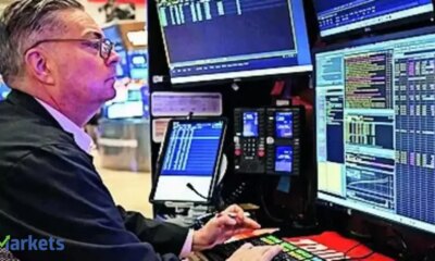 Wall Street ends higher; banks gain following results, chips rally with TSMC