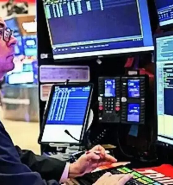 Wall Street ends higher; banks gain following results, chips rally with TSMC