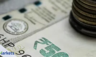 Rupee breaches 91/USD mark 2nd time in a month, ends 14 paise lower