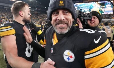 Pittsburgh Steelers quarterback Aaron Rodgers greets tight end Pat Freiermuth after an NFL football game against the Baltimore Ravens
