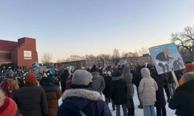 EXCLUSIVE: Thousands attend Alex Pretti vigil in Whittier Park as nearby shops board up windows and doors