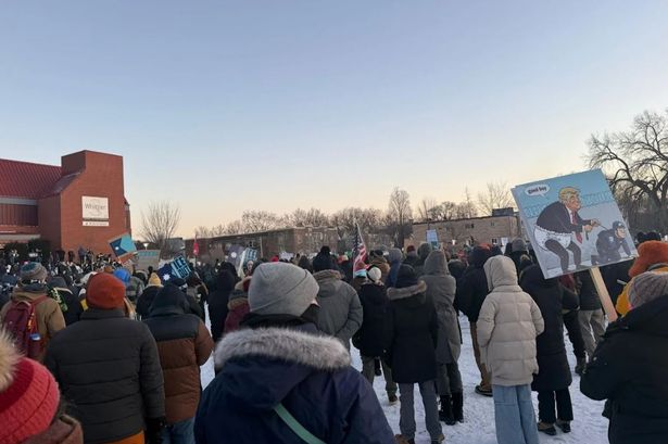 EXCLUSIVE: Thousands attend Alex Pretti vigil in Whittier Park as nearby shops board up windows and doors