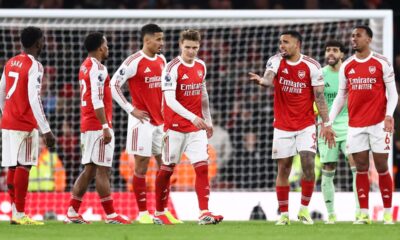 Gabriel Jesus of Arsenal and Martin Odegaard of Arsenal react after conceding during the Premier League match between Arsenal and Manchester United