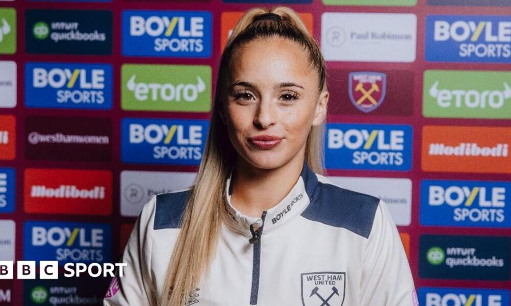 West Ham's Ria Bose poses in signing promo