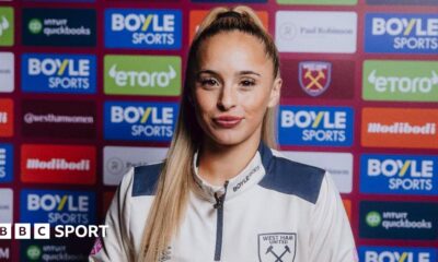 West Ham's Ria Bose poses in signing promo