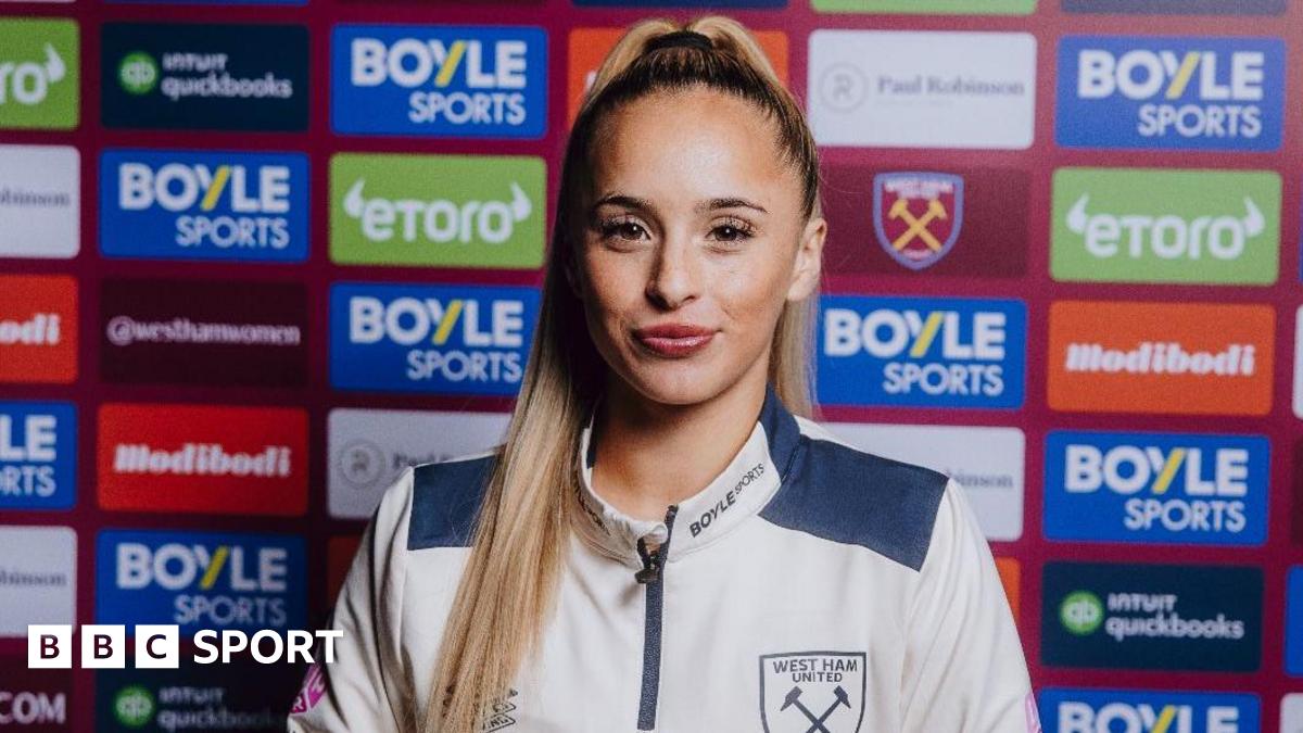 West Ham's Ria Bose poses in signing promo