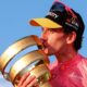Simon Yates with the Giro d'Italia trophy in 2025