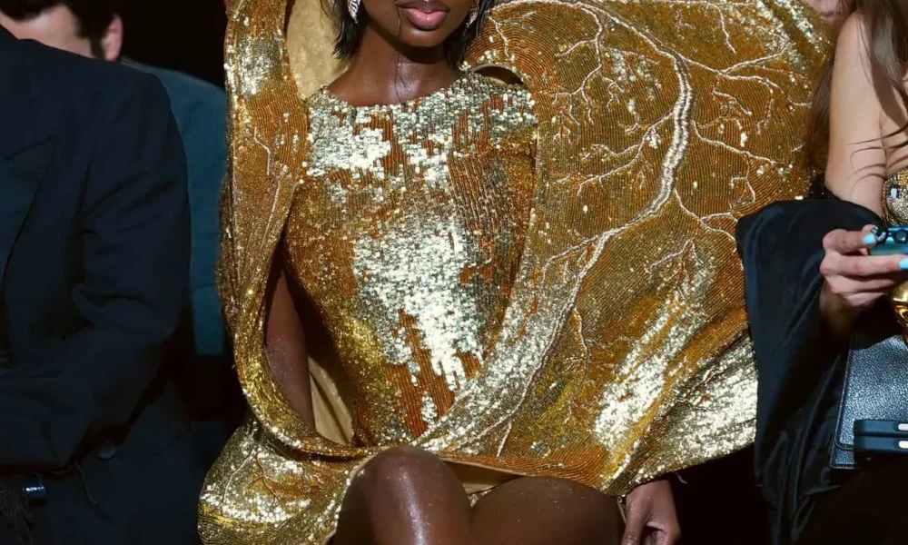 2 Olandria In A Gold Sculptural Rahul Mishra Couture Gown At Paris Fashion Week