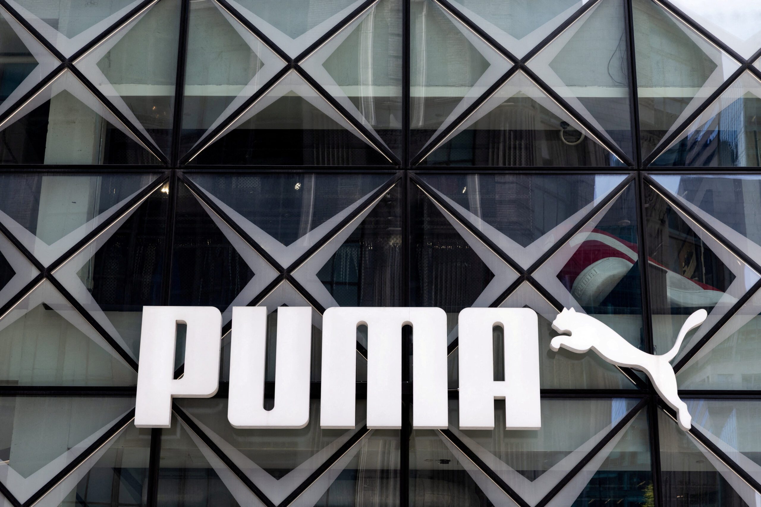 China's Anta Sports has offered to buy Pinault family's 29% Puma stake, sources say