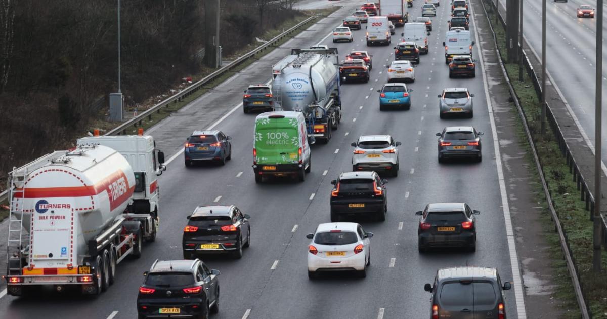 M60 motorway closed due to flooding - live